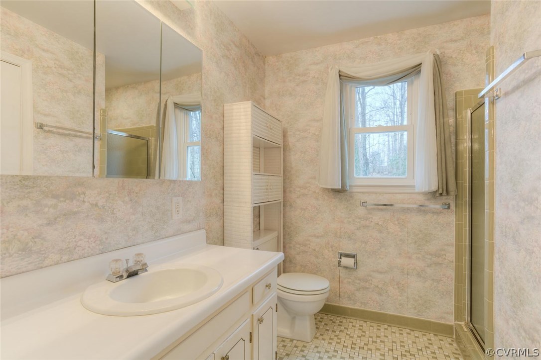 12901 Middlebrook Road Chester, VA 23831 - Photo 25 of 38 a bathroom with a sink toilet and shower