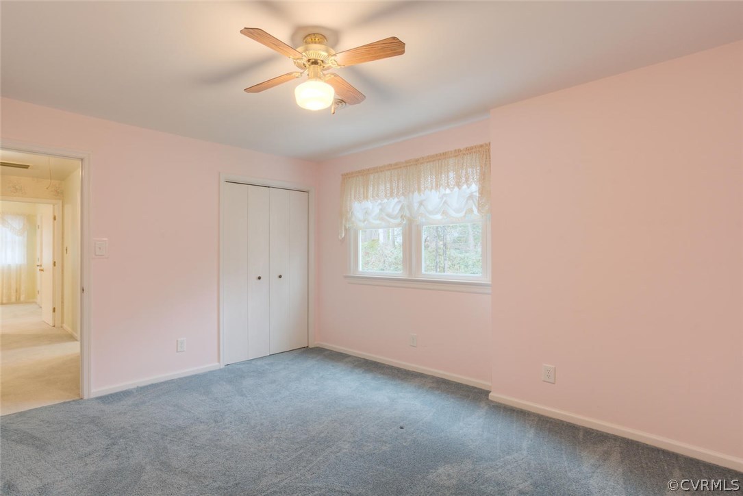 12901 Middlebrook Road Chester, VA 23831 - Photo 32 of 38 an empty room with windows and fan