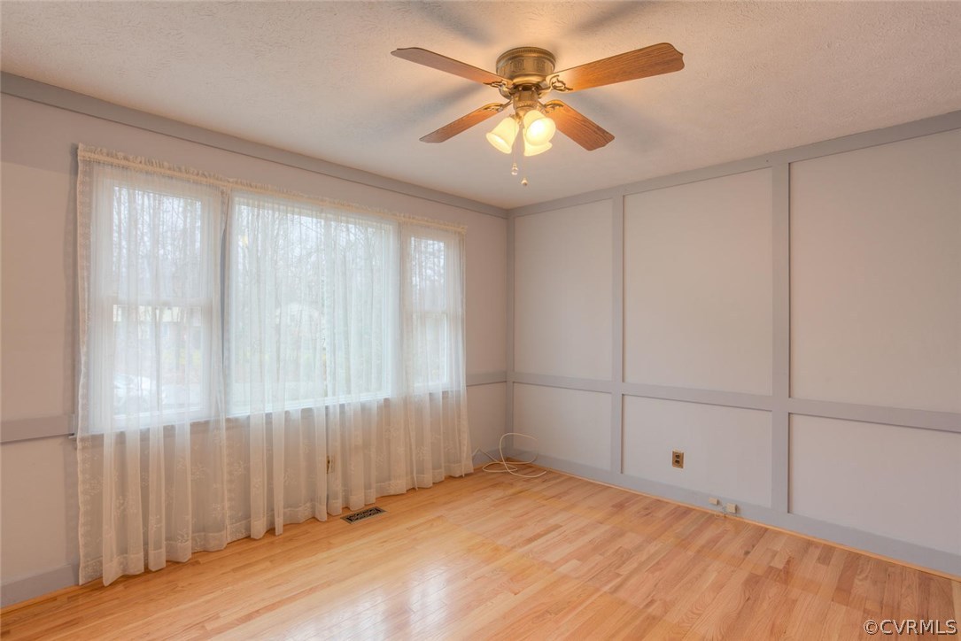 12901 Middlebrook Road Chester, VA 23831 - Photo 5 of 38 a view of an empty room with a window