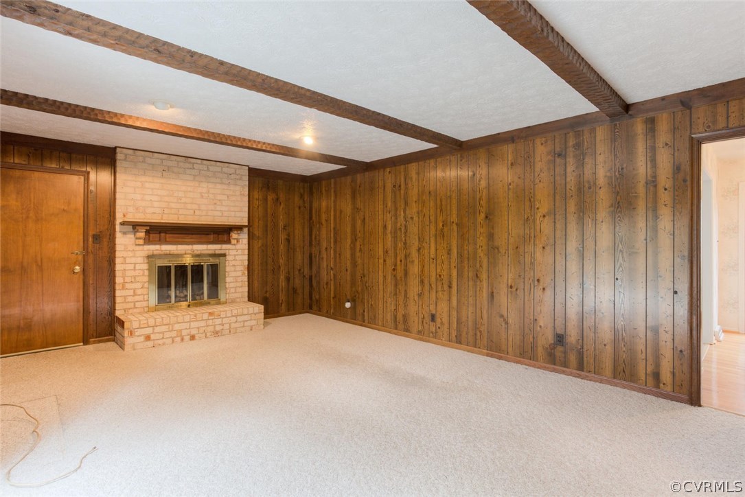12901 Middlebrook Road Chester, VA 23831 - Photo 10 of 38 a view of an empty room with a fireplace and a window