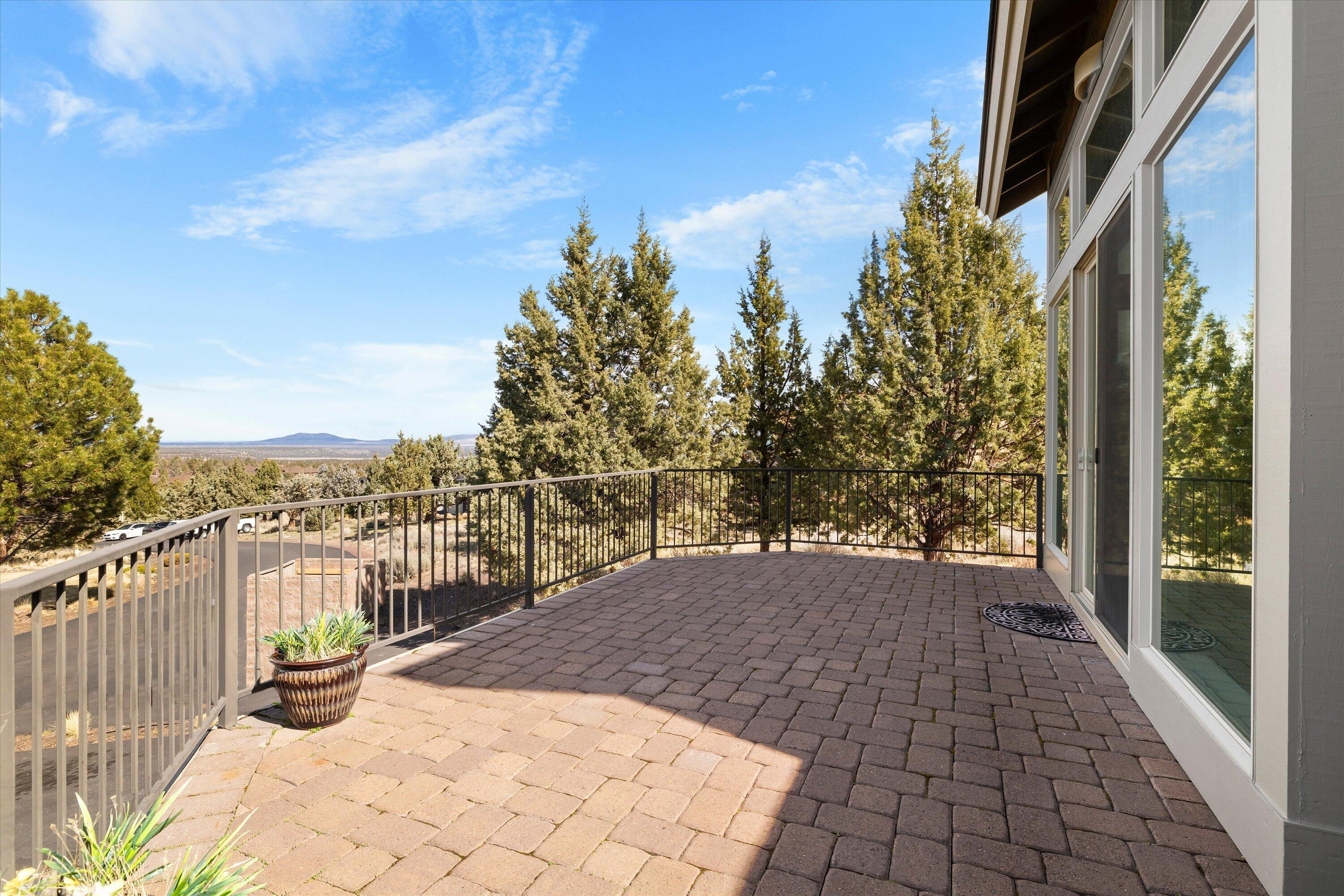 10879 Village Loop Redmond, OR 97756 - Photo 27 of 37 Large outdoor paver deck