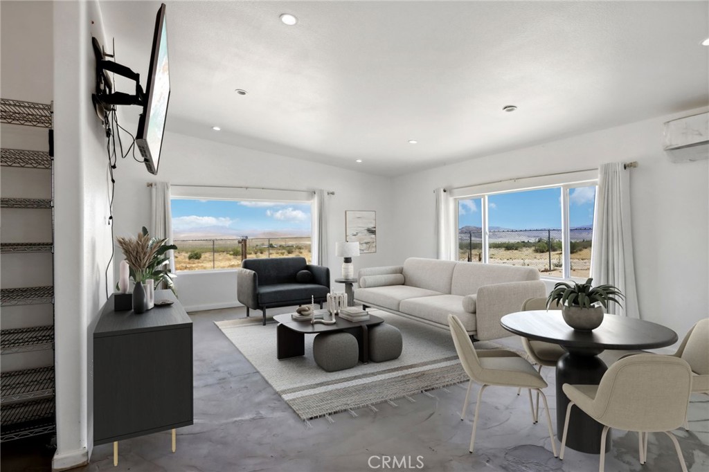51474 Mills Road Johnson Valley, CA 92285 - Photo 11 of 56 a living room with furniture and a large window