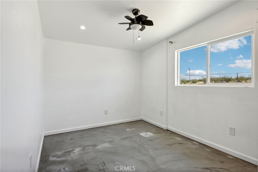 51474 Mills Road Johnson Valley, CA 92285 - Photo 18 of 56 an empty room with a window