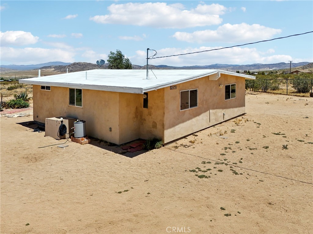 51474 Mills Road Johnson Valley, CA 92285 - Photo 33 of 56 a view of a backyard of the house