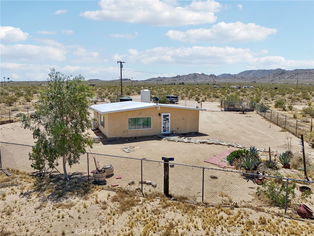 51474 Mills Road Johnson Valley, CA 92285 - Photo 5 of 56 a view of a terrace with a flat screen tv