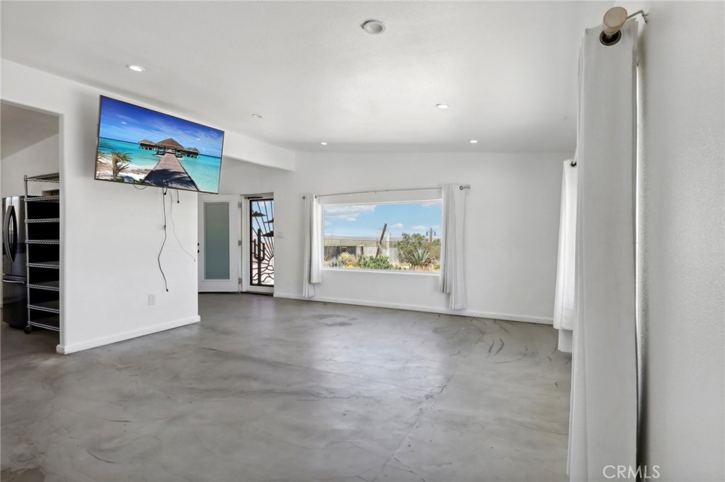 51474 Mills Road Johnson Valley, CA 92285 - Photo 10 of 56 a view of an empty room with a fireplace