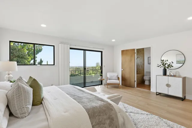 a view of storage and utility room with washer and dryer