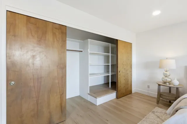 a view of an empty room with empty racks