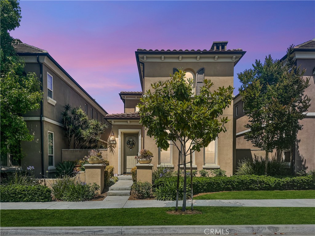 75 Rinaldi Irvine, CA 92620 - Photo 1 of 1 a front view of a house with a yard
