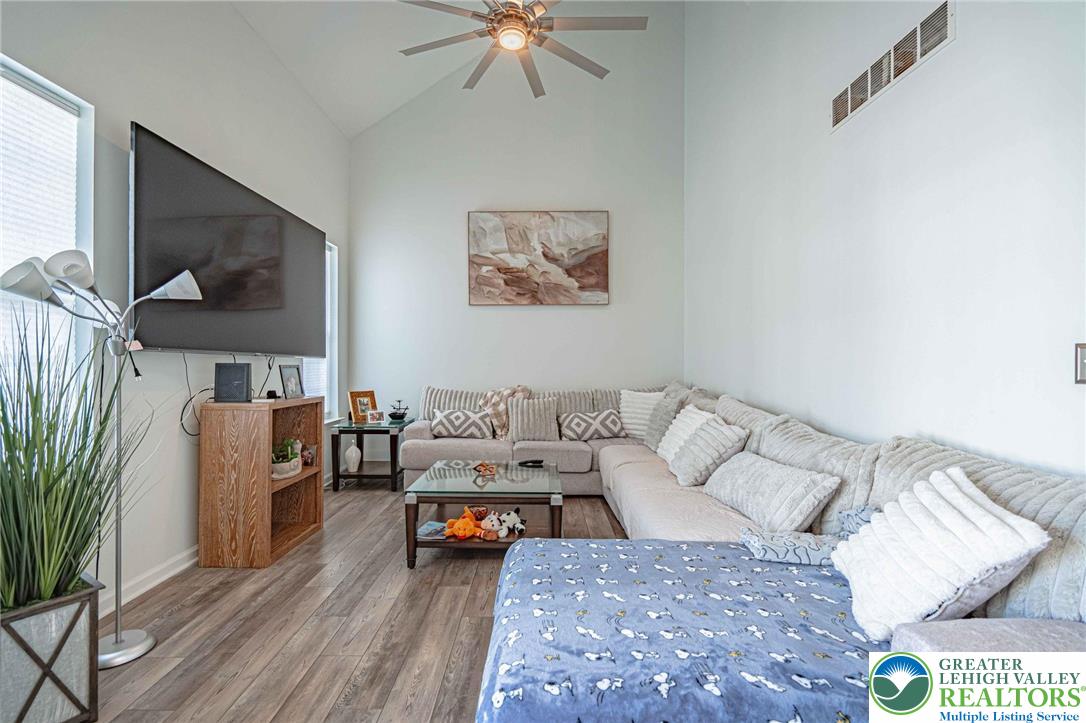 4435 Stole Road Emmaus, PA 18049 - Photo 23 of 64 a living room with furniture and a flat screen tv