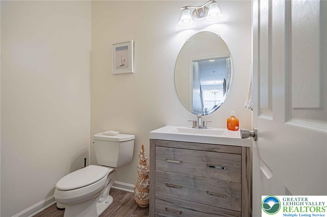 4435 Stole Road Emmaus, PA 18049 - Photo 26 of 64 a bathroom with a toilet a sink and mirror