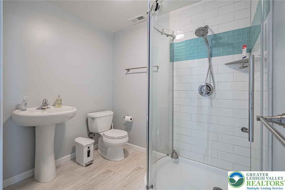 4435 Stole Road Emmaus, PA 18049 - Photo 51 of 64 a bathroom with a sink toilet and shower