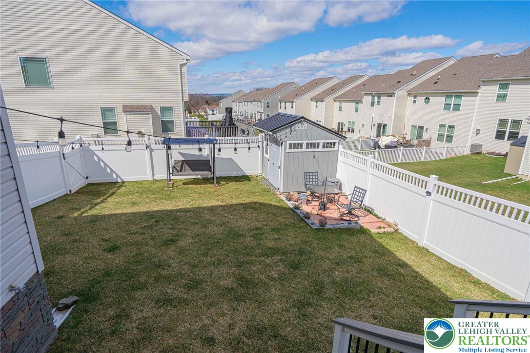 4435 Stole Road Emmaus, PA 18049 - Photo 57 of 64 a view of a house with a yard and sitting area
