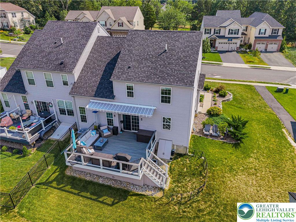 4435 Stole Road Emmaus, PA 18049 - Photo 61 of 64 an aerial view of a house with swimming pool a yard and a fountain