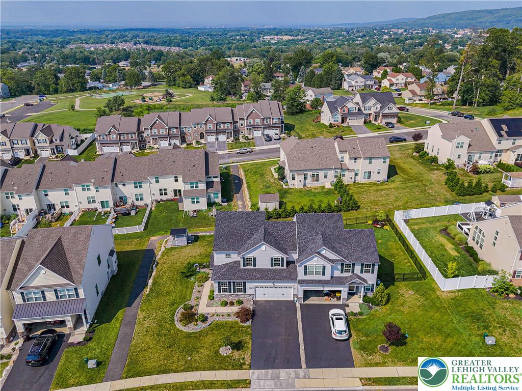 4435 Stole Road Emmaus, PA 18049 - Photo 62 of 64 an aerial view of residential houses with outdoor space and parking