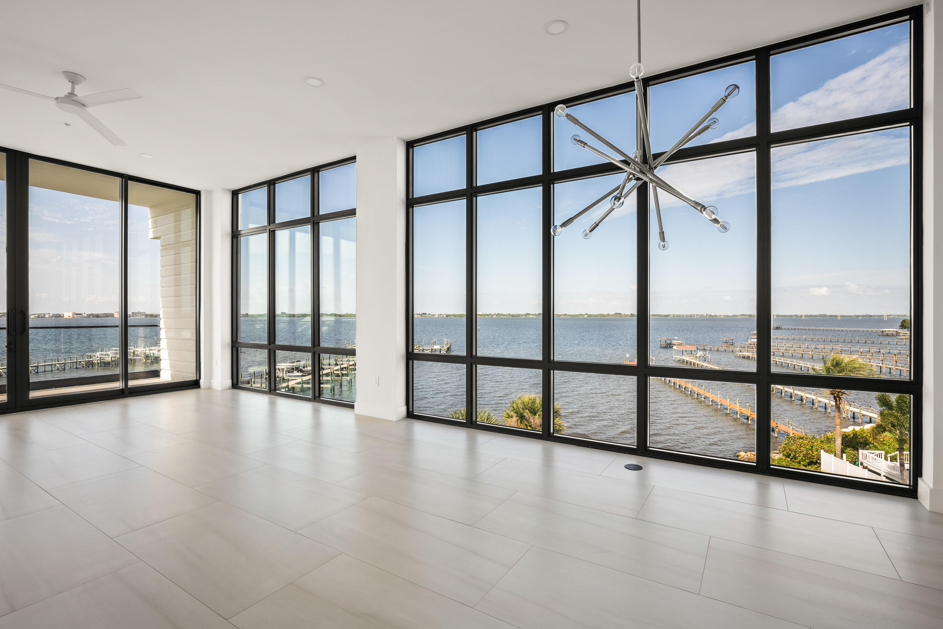 wooden floor with windows and city view