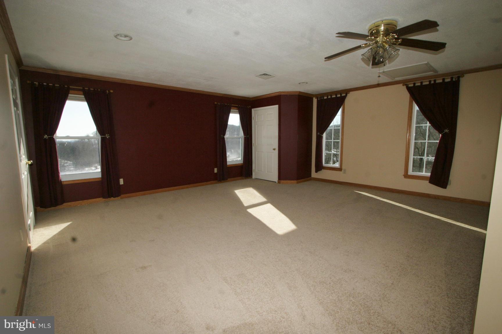 13102 Draper Road Clear Spring, MD 21722 - Photo 14 of 26 a view of empty room with a fireplace