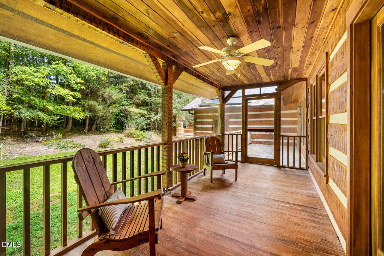 1114 Phil's Ridge Road Chapel Hill, NC 27516 - Photo 11 of 52 a view of a chairs and table in the balcony