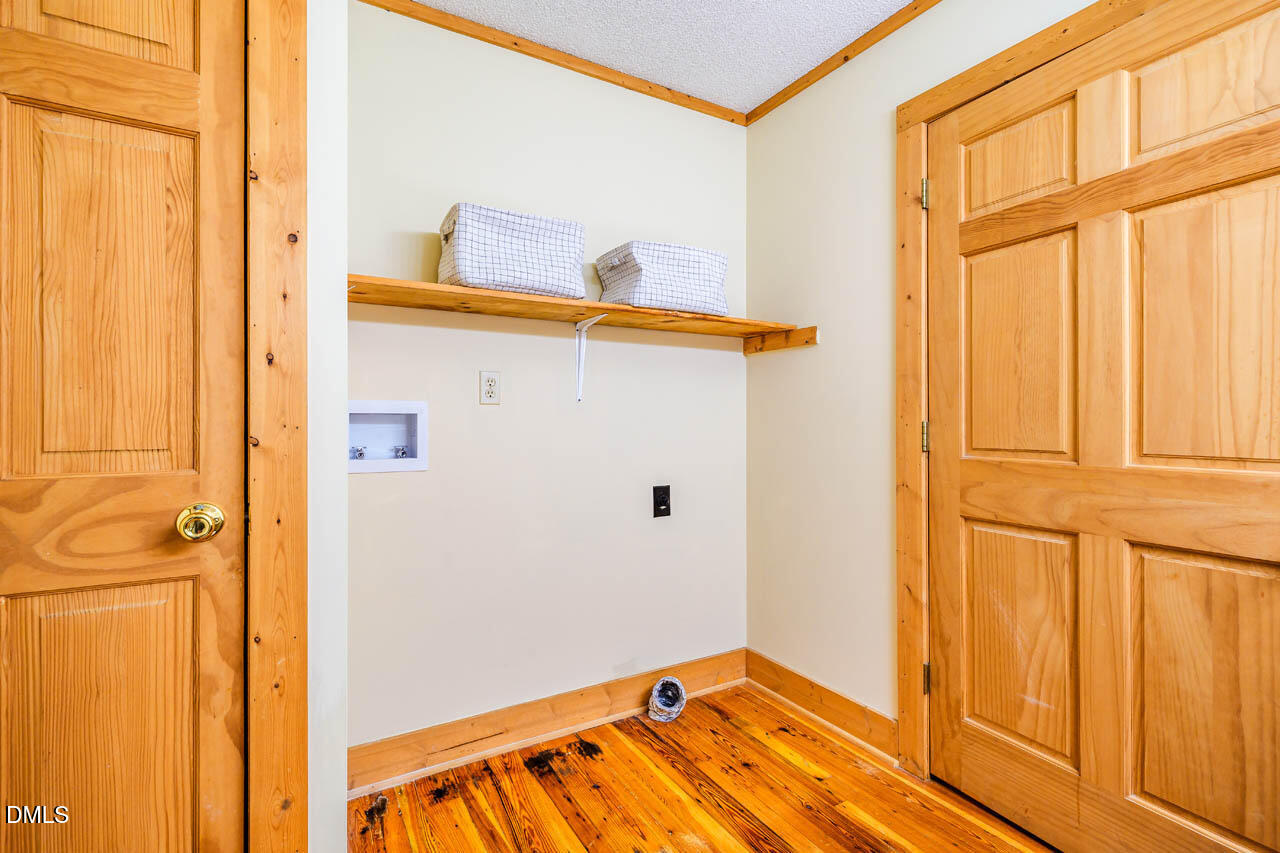 1114 Phil's Ridge Road Chapel Hill, NC 27516 - Photo 17 of 52 a view of a room with door