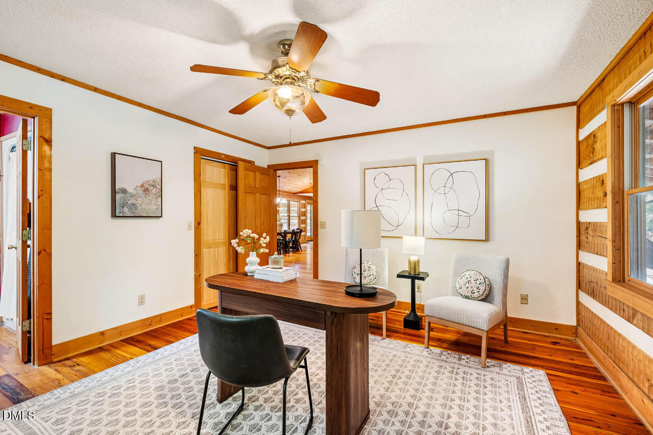 1114 Phil's Ridge Road Chapel Hill, NC 27516 - Photo 25 of 52 a living room with furniture and a window
