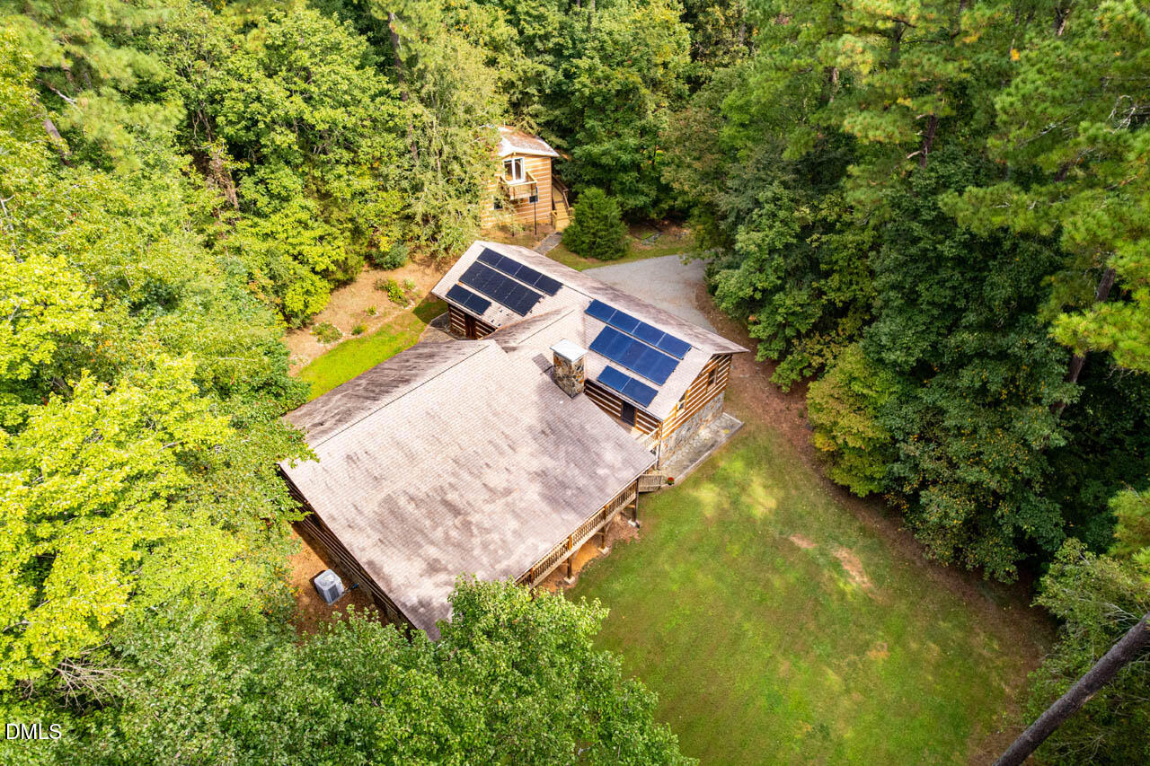 1114 Phil's Ridge Road Chapel Hill, NC 27516 - Photo 30 of 52 view of a back yard of the house