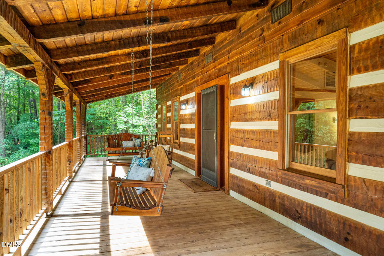 1114 Phil's Ridge Road Chapel Hill, NC 27516 - Photo 3 of 52 a view of balcony with wooden floor