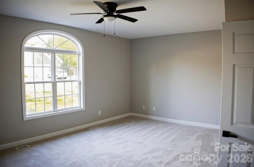 1304 Overhill Road Salisbury, NC 28144 - Photo 13 of 24 wooden floor in an empty room with a window