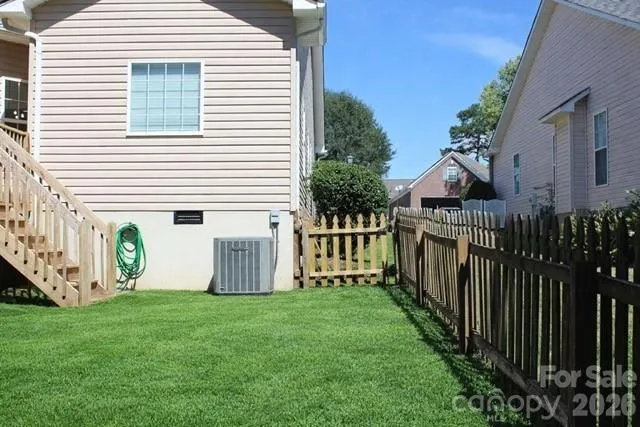 a view of back yard of front a house