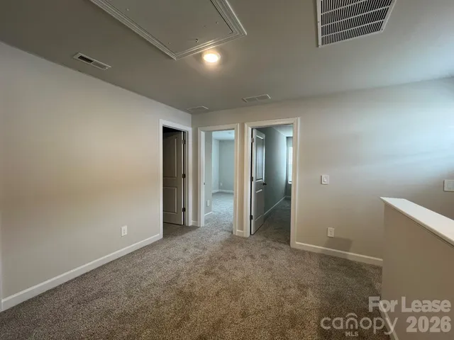 a view of hallway with natural light