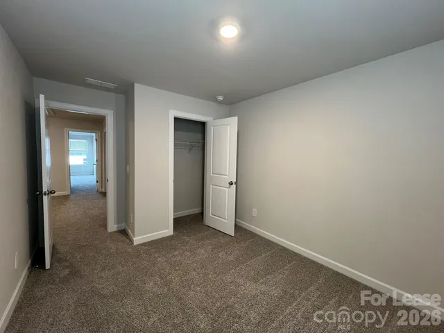 an empty room with a bathroom
