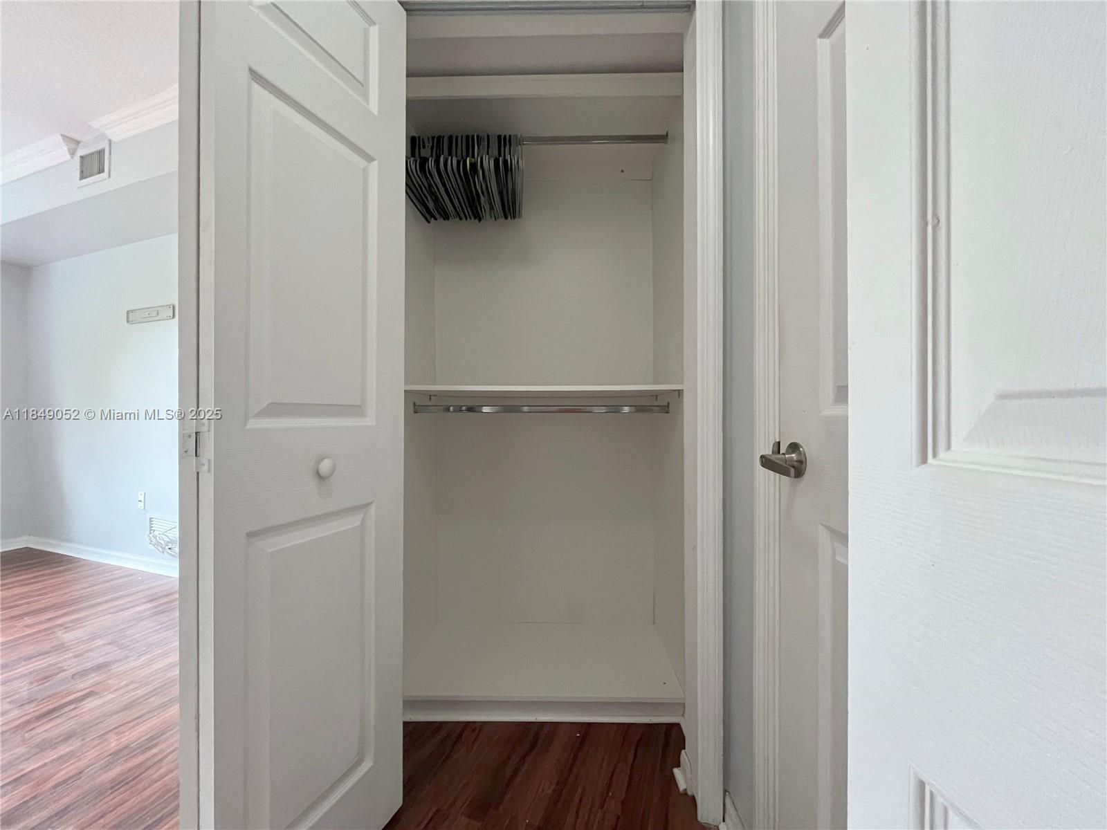 2415 Northwest 16th St Road, Unit 3031 Miami, FL 33125 - Photo 14 of 22 a view of a walk in closet