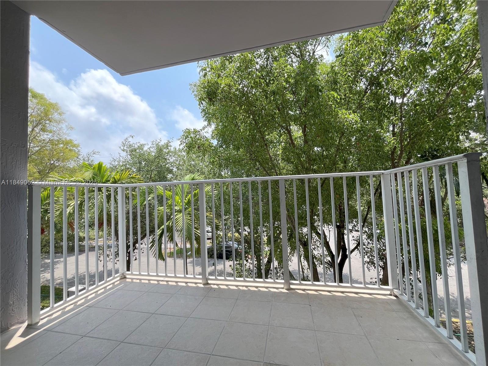 2415 Northwest 16th St Road, Unit 3031 Miami, FL 33125 - Photo 21 of 22 a view of a balcony