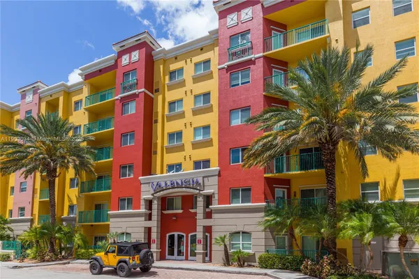 a front view of a multi story residential apartment building