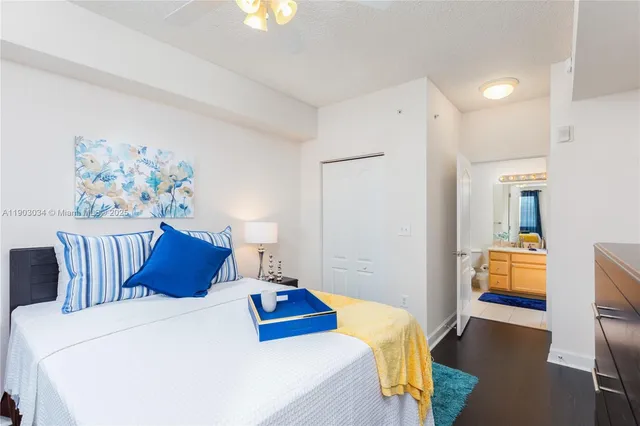 a bedroom with a bed and a couch