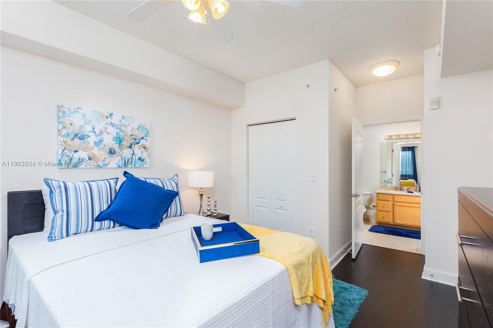 6001 Southwest 70th Street, Unit 610 South Miami, FL 33143 - Photo 11 of 18 a bedroom with a bed and a couch