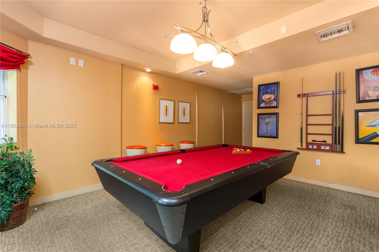 6001 Southwest 70th Street, Unit 610 South Miami, FL 33143 - Photo 18 of 18 a room with pool table and windows