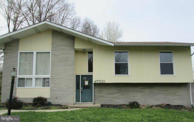4700 Duncannon Road Baltimore, MD 21208 - Photo 1 of 15 a front view of a house with garden