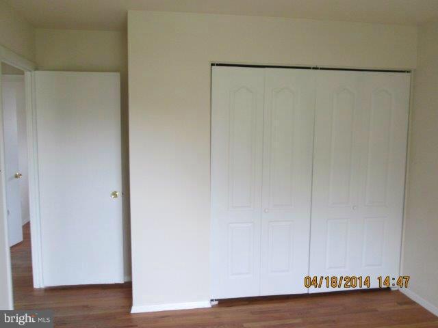 4700 Duncannon Road Baltimore, MD 21208 - Photo 15 of 15 a view of a room with wooden floor