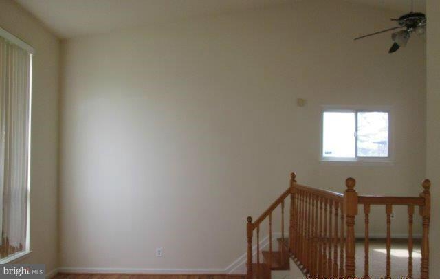 4700 Duncannon Road Baltimore, MD 21208 - Photo 3 of 15 a view of staircase with railing and a window