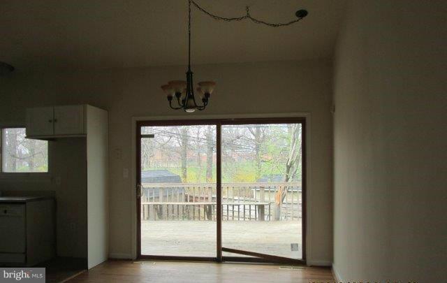 4700 Duncannon Road Baltimore, MD 21208 - Photo 4 of 15 a view of a hallway with windows