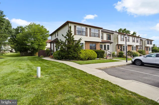 a view of building with yard