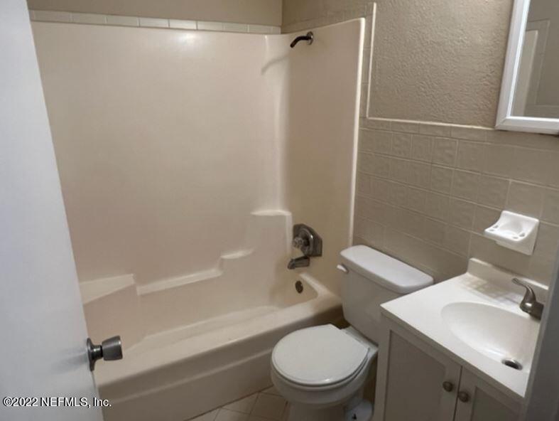 108 River Rd Drive Palatka, FL 32177 - Photo 4 of 11 a white toilet sitting next to a bath tub