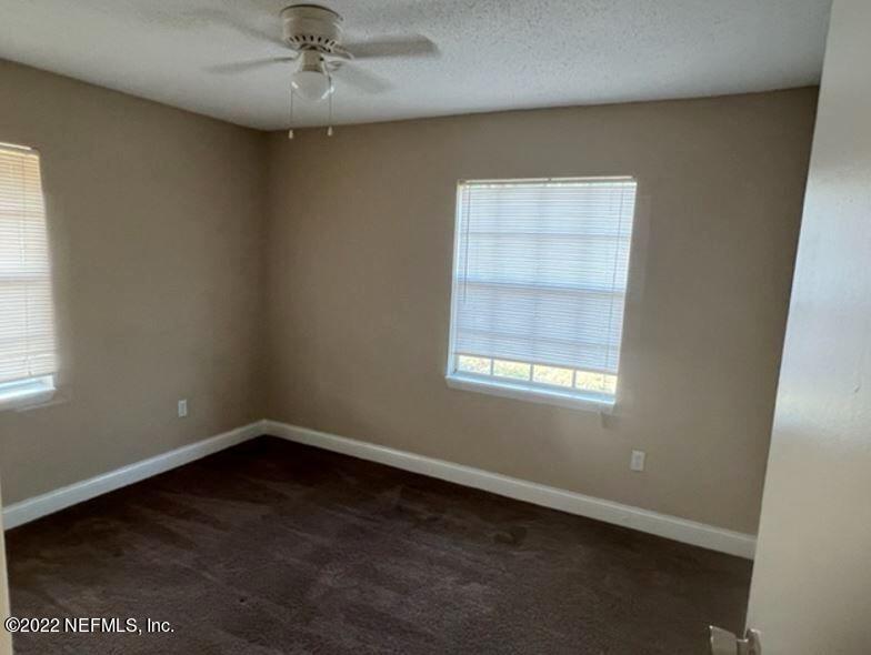 108 River Rd Drive Palatka, FL 32177 - Photo 6 of 11 an empty room with a window