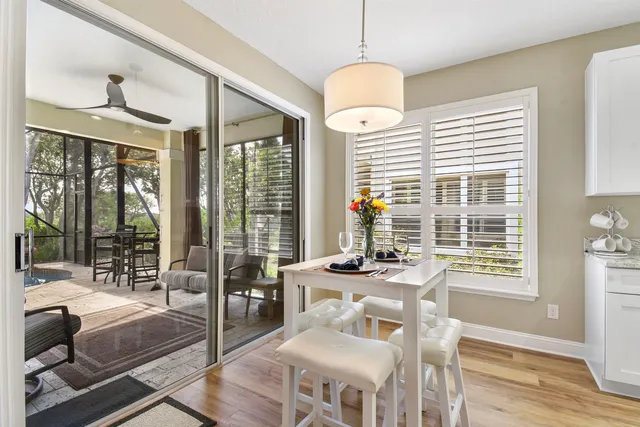 a spacious bedroom with a large bed and a large window