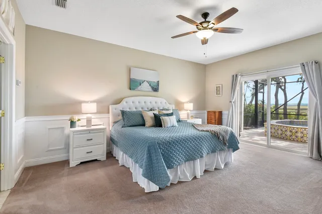 an aerial view of a house with a swimming pool