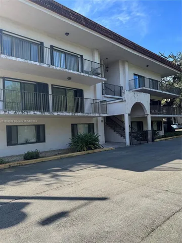 a front view of a house with yard
