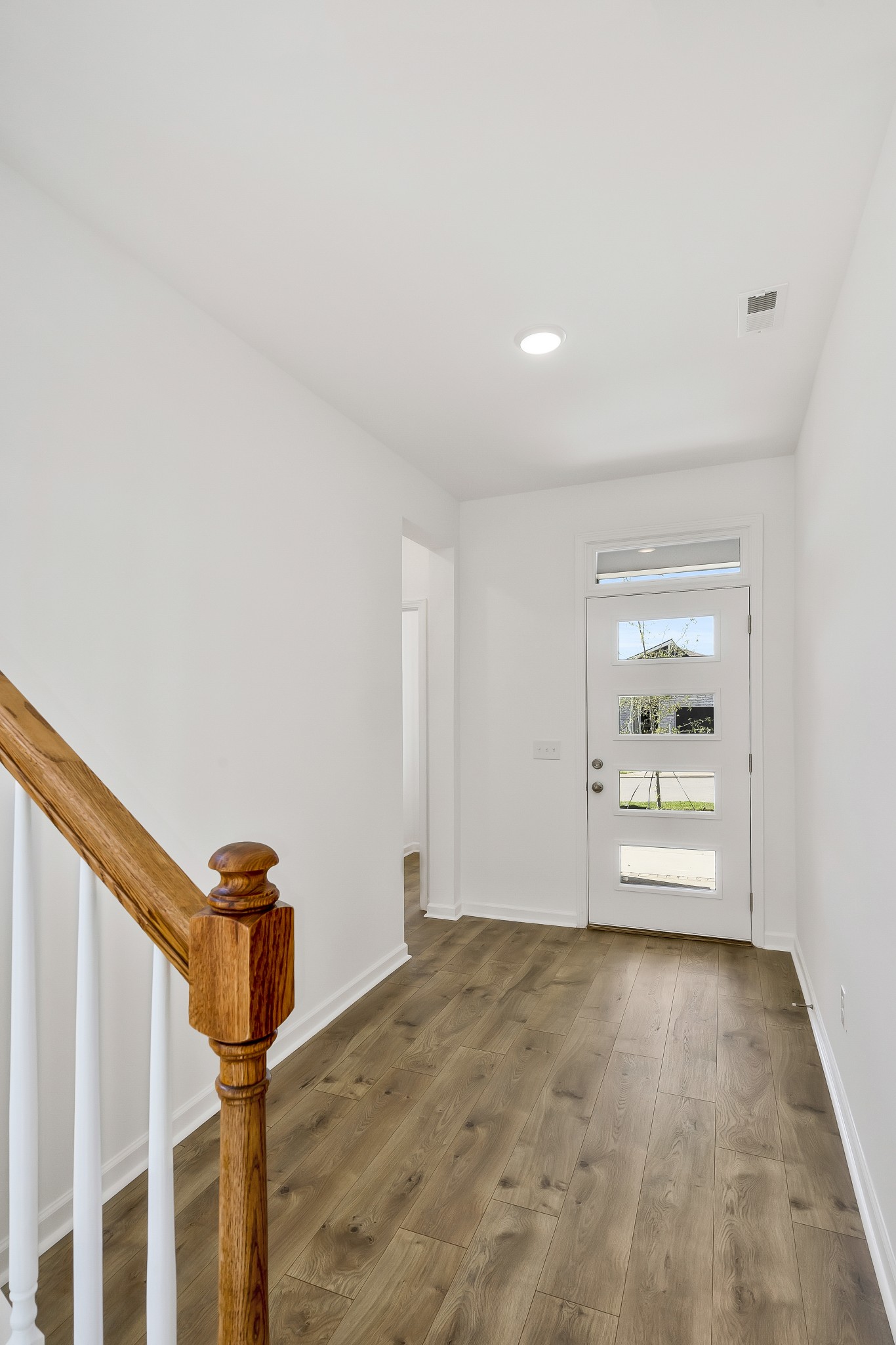 2052 Mackinac Bend Gallatin, TN 37066 - Photo 25 of 38 a view of an empty room with wooden floor and window