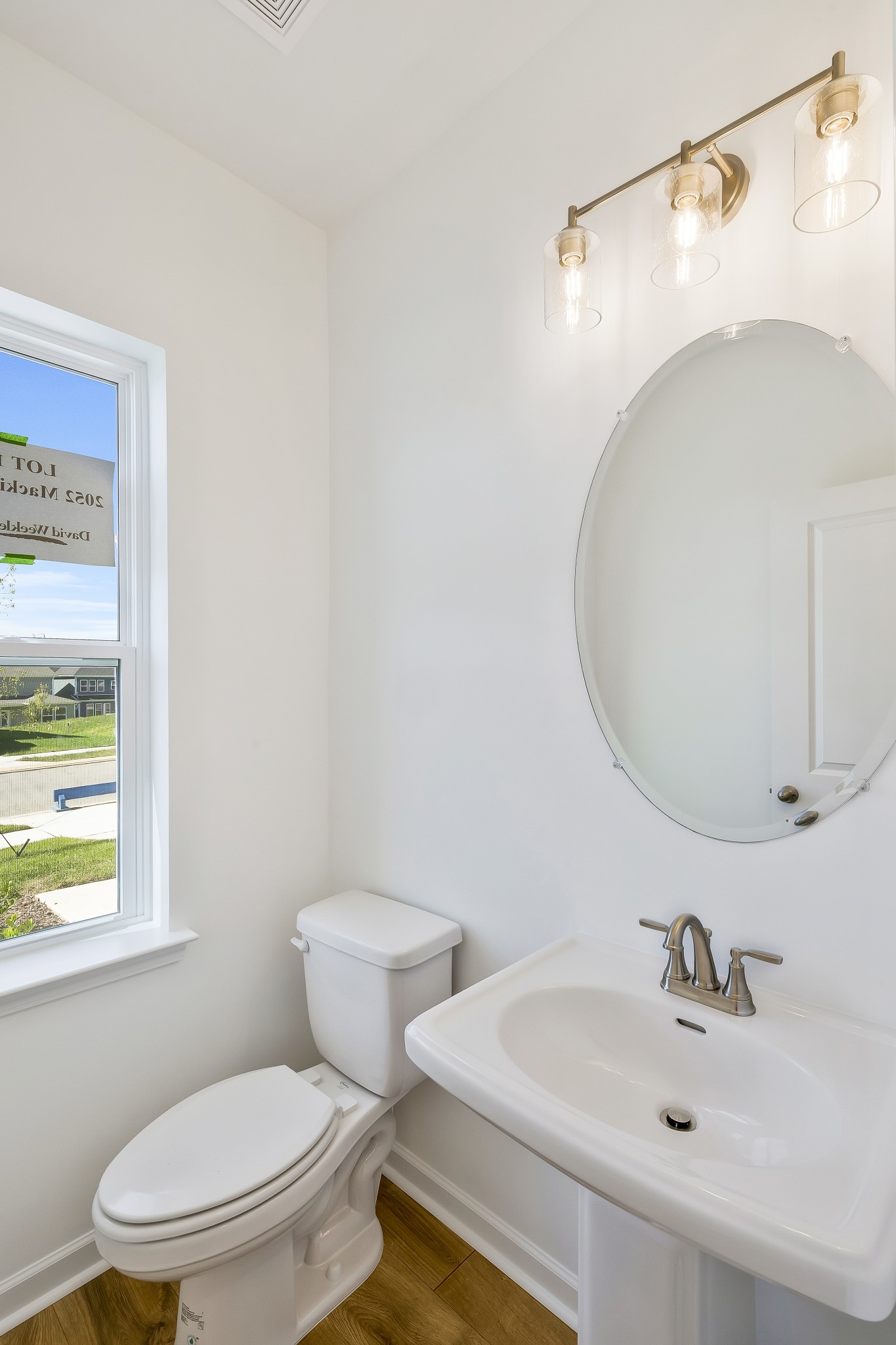 2052 Mackinac Bend Gallatin, TN 37066 - Photo 26 of 38 a bathroom with a sink mirror vanity and toilet
