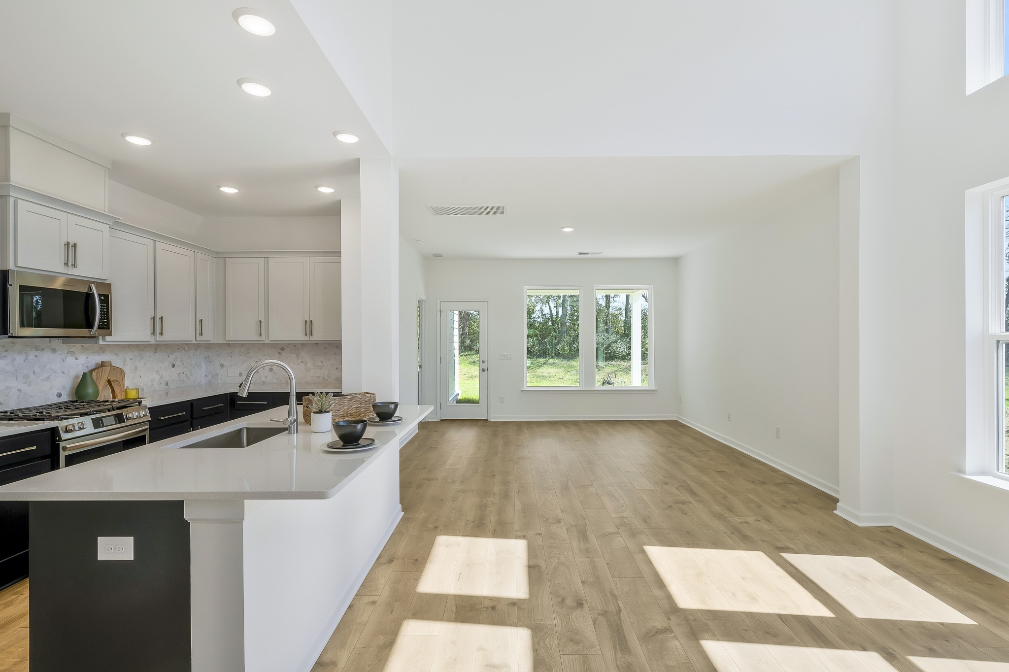 2052 Mackinac Bend Gallatin, TN 37066 - Photo 5 of 38 a kitchen that has a sink a stove counter top space and a window