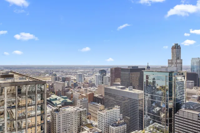 a view of a living room and floor to ceiling window